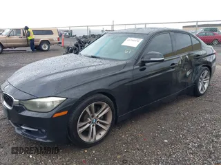 2013 BMW 3 Series 328i with VIN WBA3A5C56DF453232, listed as a IAAI auction lot 41794450 with 152,304 mi miles. Bid and sale history available at carsss.com. Image 2.