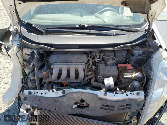 2011 Honda Fit Sport z VIN JHMGE8H59BC002425, wystawiony jako Copart lot #69977564 z przebiegiem 137 729 mil mil oraz Szkoda całkowita • Salvage title. Historia ofert i sprzedaży dostępna na DreamBid. Obrazek 13.