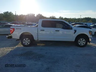 2023 Ford F-150 XL with VIN 1FTEW1EP0PKD78656, listed as a IAAI auction lot 41277719 with 21,825 mi miles. Bid and sale history available at carsss.com. Image 13.