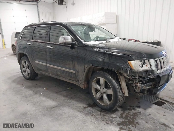 2011 Jeep Grand Cherokee Overland Summit with VIN 1J4RR6GT5BC702214, listed as a IAAI auction lot 41368605 with 183,068 mi miles. Bid and sale history available at carsss.com. Image 1.