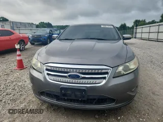 2011 Ford Taurus Limited z VIN 1FAHP2JW1BG156691, wystawiony jako Copart lot #59811755 z przebiegiem 162 828 mil mil oraz Szkoda całkowita • Salvage title. Historia ofert i sprzedaży dostępna na DreamBid. Obrazek 5.