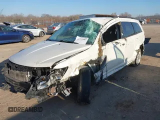 2016 Dodge Journey American Value with VIN 3C4PDCAB5GT151997, listed as a IAAI auction lot 41771583 with Not Provided miles and . Bid and sale history available at DreamBid. Image 2.