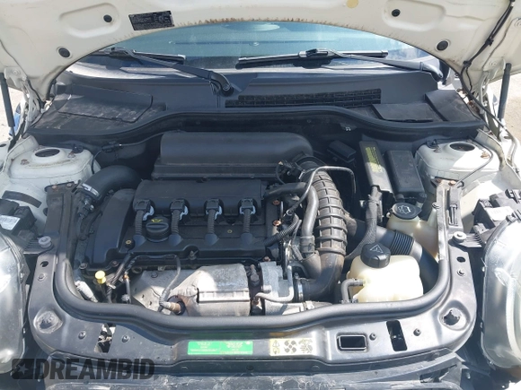 2007 MINI Hardtop S with VIN WMWMF73567TT84033, listed as a IAAI auction lot 42189573 with 75,177 mi miles and . Bid and sale history available at DreamBid. Image 10.