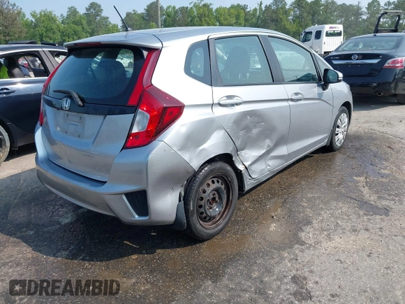 2017 Honda Fit LX z VIN 3HGGK5H50HM705123, wystawiony jako IAAI lot #42427270 z przebiegiem 328 978 mil mil oraz . Historia ofert i sprzedaży dostępna na DreamBid. Obrazek 4.