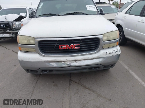 2002 GMC Yukon SLT with VIN 1GKEC13T02R313772, listed as a IAAI auction lot 42131289 with 215,164 mi miles. Bid and sale history available at carsss.com. Image 6.