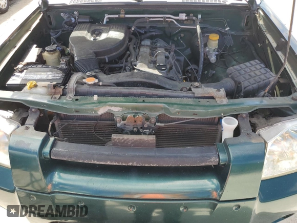 2002 Nissan Frontier z VIN 1N6DD26S72C305908, wystawiony jako Copart lot #78680354 z przebiegiem 176 805 mil mil oraz Szkoda całkowita • Salvage title. Historia ofert i sprzedaży dostępna na DreamBid. Obrazek 11.