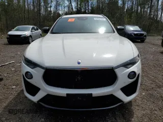 2020 Maserati Levante S z VIN ZN661YUS4LX353935, wystawiony jako Copart lot #52856194 z przebiegiem 36 118 mil mil oraz Czysty tytuł • Clean title. Historia ofert i sprzedaży dostępna na DreamBid. Obrazek 5.