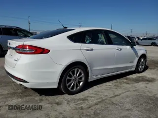 2017 Ford Fusion Hybrid SE with VIN 3FA6P0LU0HR384609, listed as a Copart auction lot 49103125 with 105,976 mi miles and Salvage title. Bid and sale history available at DreamBid. Image 3.