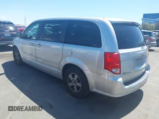 2012 Dodge Grand Caravan SXT with VIN 2C4RDGCG7CR204835, listed as a IAAI auction lot 41948688 with 125,466 mi miles and . Bid and sale history available at DreamBid. Image 3.