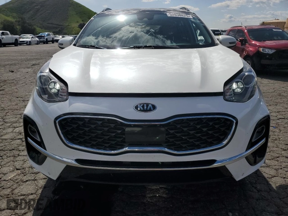 2020 Kia Sportage EX z VIN KNDPNCAC0L7805972, wystawiony jako Copart lot #52038825 z przebiegiem 65 794 mil mil oraz Szkoda całkowita • Salvage title. Historia ofert i sprzedaży dostępna na DreamBid. Obrazek 5.