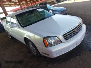 2004 Cadillac DeVille DHS z VIN 1G6KE54Y54U241593, wystawiony jako IAAI lot #41473168 z przebiegiem 117 067 mil mil oraz . Historia ofert i sprzedaży dostępna na DreamBid. Obrazek 1.