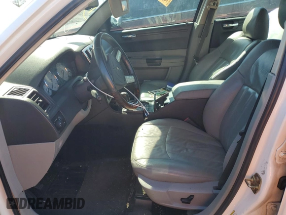 2006 Chrysler 300 C with VIN 2C3KA63H56H477106, listed as a Copart auction lot 48004705 with 174,593 mi miles and Salvage Title. Bid and sale history available at carsss.com. Image 7.
