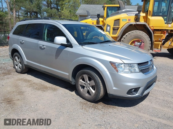 2011 Dodge Journey Mainstreet with VIN 3D4PH1FG4BT562414, listed as a IAAI auction lot 42122747 with 132,488 mi miles and . Bid and sale history available at DreamBid. Image 1.