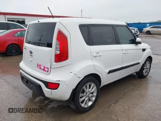 2012 Kia Soul + with VIN KNDJT2A69C7441065, listed as a IAAI auction lot 41821091 with 197,441 mi miles. Bid and sale history available at carsss.com. Image 4.