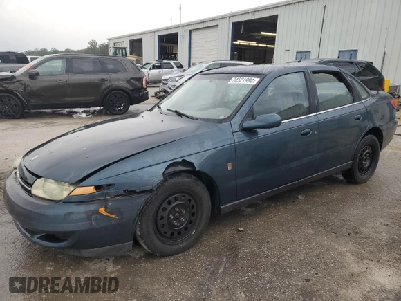 2002 Saturn LS z VIN 1G8JU54F72Y581967, wystawiony jako Copart lot #74521994 z przebiegiem 215 018 mil mil oraz Szkoda całkowita • Salvage title. Historia ofert i sprzedaży dostępna na DreamBid. Obrazek 1.
