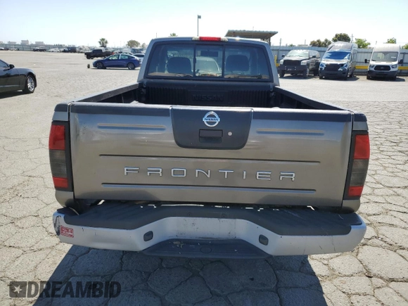 2004 Nissan Frontier XE with VIN 1N6DD26T14C412707, listed as a Copart auction lot 56789905 with 288,721 mi miles and Salvage title. Bid and sale history available at DreamBid. Image 6.