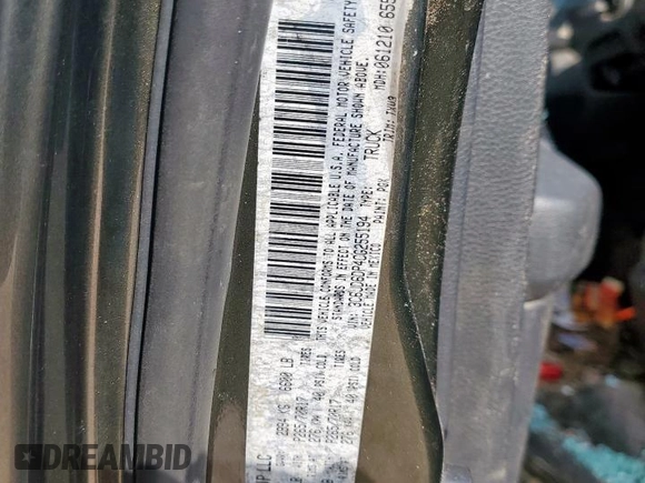 2012 Ram 1500 ST with VIN 3C6JD6DP4CG255194, listed as a Copart auction lot 59782425 with 102,259 mi miles and Salvage title. Bid and sale history available at DreamBid. Image 12.