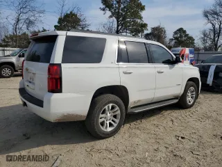2019 Chevrolet Tahoe LT with VIN 1GNSKBKC8KR392771, listed as a Copart auction lot 46893785 with 125,161 mi miles and Salvage Title. Bid and sale history available at carsss.com. Image 3.