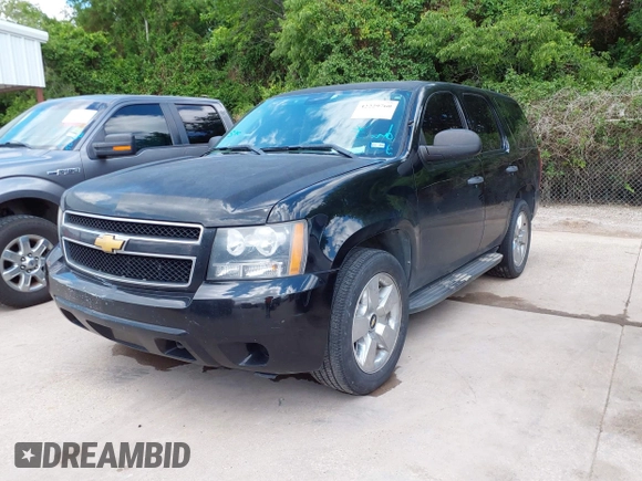2013 Chevrolet Tahoe Commercial with VIN 1GNLC2E09DR286027, listed as a IAAI auction lot 42229760 with 203,474 mi miles and . Bid and sale history available at DreamBid. Image 2.