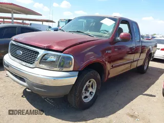 1997 Ford F-150 z VIN 2FTDX18WXVCA51615, wystawiony jako IAAI lot #42425367 z przebiegiem 160 402 mil mil oraz . Historia ofert i sprzedaży dostępna na DreamBid. Obrazek 2.