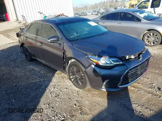 2016 Toyota Avalon Limited with VIN 4T1BK1EBXGU205973, listed as a IAAI auction lot 41206815 with 64,169 mi miles. Bid and sale history available at carsss.com. Image 1.