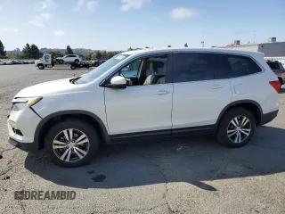 2018 Honda Pilot EX-L with VIN 5FNYF6H50JB063896, listed as a Copart auction lot 62543125 with 105,120 mi miles and Salvage title. Bid and sale history available at DreamBid. Image 1.