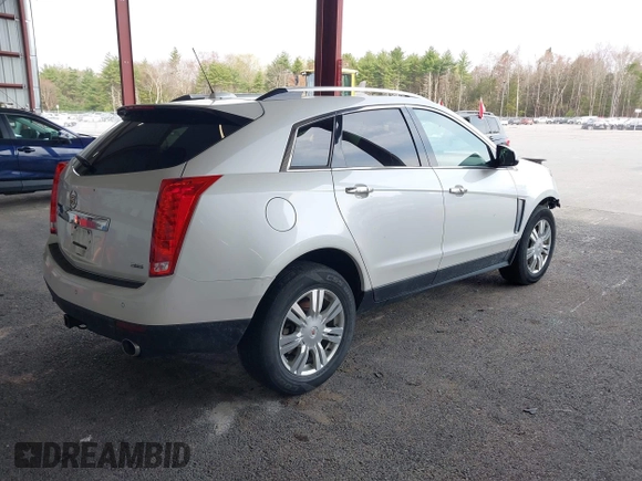 2015 Cadillac SRX Luxury Collection with VIN 3GYFNEE30FS567431, listed as a IAAI auction lot 42118084 with 140,778 mi miles. Bid and sale history available at carsss.com. Image 4.