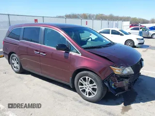 2012 Honda Odyssey EX with VIN 5FNRL5H42CB136915, listed as a IAAI auction lot 41972714 with 211,729 mi miles and . Bid and sale history available at carsss.com. Image 1.