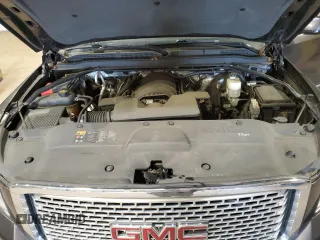 2015 GMC Yukon Denali with VIN 1GKS2CKJ2FR677604, listed as a Copart auction lot 51714505 with 146,648 mi miles and Salvage Title. Bid and sale history available at carsss.com. Image 12.