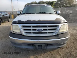 1999 Ford F-150 XL with VIN 1FTRX17L6XNA06844, listed as a Copart auction lot 83109004 with Not Provided miles and Salvage Title. Bid and sale history available at carsss.com. Image 5.