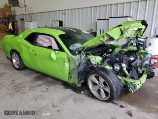 2015 Dodge Challenger R/T Plus with VIN 2C3CDZBT1FH712684, listed as a Copart auction lot 45032235 with 64,299 mi miles and Salvage Title. Bid and sale history available at carsss.com. Image 4.