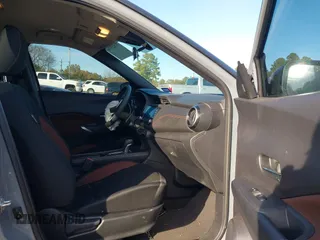 2024 Nissan Kicks SR with VIN 3N1CP5DV9RL479629, listed as a IAAI auction lot 41025530 with 9,915 mi miles. Bid and sale history available at carsss.com. Image 5.