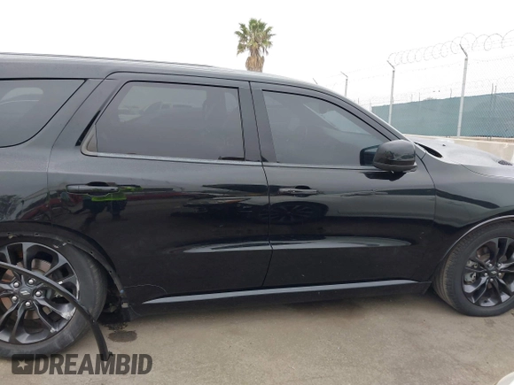 2021 Dodge Durango R/T with VIN 1C4SDHCT5MC660105, listed as a IAAI auction lot 42373172 with 75,227 mi miles and . Bid and sale history available at DreamBid. Image 13.