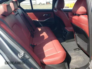 2023 BMW 3 Series 330e xDrive with VIN 3MW39FS02P8D01319, listed as a Copart auction lot 67836734 with 12,883 mi miles and Salvage Title. Bid and sale history available at carsss.com. Image 10.