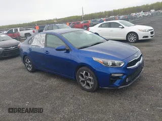2019 Kia Forte LXS z VIN 3KPF24AD6KE041448, wystawiony jako IAAI lot #42035571 z przebiegiem 128 536 mil mil oraz . Historia ofert i sprzedaży dostępna na DreamBid. Obrazek 1.