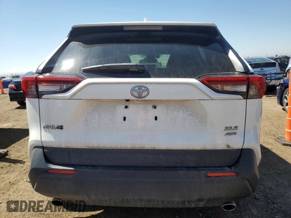 2019 Toyota RAV4 XLE with VIN JTMP1RFVXKD021338, listed as a Copart auction lot 52578515 with 41,327 mi miles and Salvage Title. Bid and sale history available at DreamBid. Image 6.