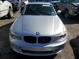2009 BMW 1 Series 128i with VIN WBAUP93529VF48915, listed as a Copart auction lot 80310034 with 143,208 mi miles and Salvage title. Bid and sale history available at DreamBid. Image 5.
