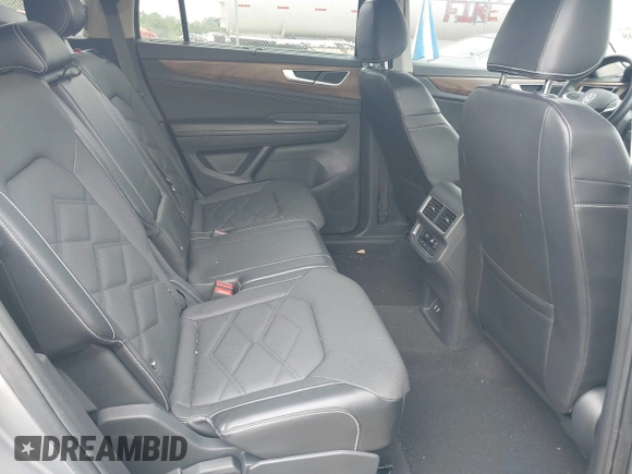 2024 Volkswagen Atlas SE with VIN 1V2WR2CA6RC574936, listed as a IAAI auction lot 42257308 with 23,370 mi miles and . Bid and sale history available at DreamBid. Image 8.