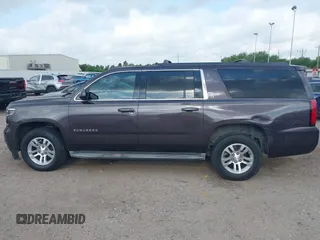 2015 Chevrolet Suburban LT with VIN 1GNSCJKCXFR175154, listed as a IAAI auction lot 42280418 with 227,373 mi miles and . Bid and sale history available at DreamBid. Image 14.