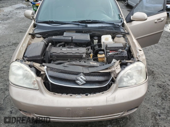 2007 Suzuki Forenza z VIN KL5JD56Z07K657218, wystawiony jako Copart lot #86767854 z przebiegiem 93 044 mil mil oraz Szkoda całkowita • Salvage title. Historia ofert i sprzedaży dostępna na DreamBid. Obrazek 11.
