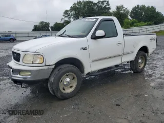 1997 Ford F-150 with VIN 1FTDF18W5VNA74751, listed as a Copart auction lot 58292805 with 242,008 mi miles and Salvage title. Bid and sale history available at DreamBid. Image 1.