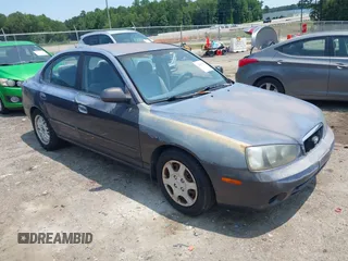 2001 Hyundai Elantra GLS z VIN KMHDN45D21U175278, wystawiony jako IAAI lot #42390546 z przebiegiem 250 001 mil mil oraz . Historia ofert i sprzedaży dostępna na DreamBid. Obrazek 1.