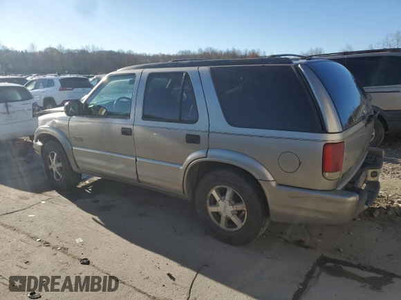 2000 Oldsmobile Bravada z VIN 1GHDT13WXY2255649, wystawiony jako Copart lot #80021214 z przebiegiem Nie podano mil oraz Szkody całkowita. Historia ofert i sprzedaży dostępna na DreamBid. Obrazek 2.