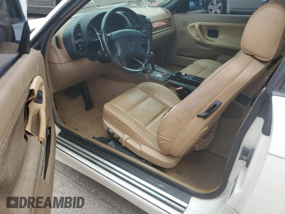 1997 BMW 3-Series 328IC with VIN WBABK8324VET95323, listed as a Copart auction lot 74764384 with 0 mi miles and Non Repairable. Bid and sale history available at carsss.com. Image 8.
