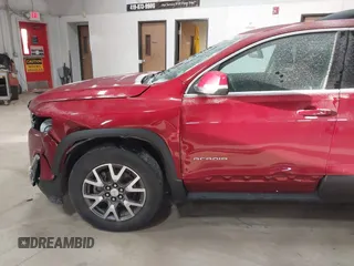 2020 GMC Acadia SLE with VIN 1GKKNKLA7LZ210660, listed as a IAAI auction lot 41374358 with 59,083 mi miles and . Bid and sale history available at carsss.com. Image 12.