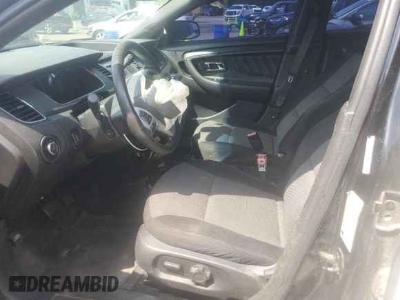 2014 Ford Police Interceptor with VIN 1FAHP2MK0EG131679, listed as a Copart auction lot 53848965 with 163,894 mi miles and Salvage title. Bid and sale history available at DreamBid. Image 7.
