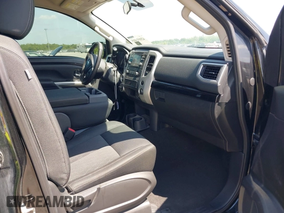 2018 Nissan Titan SV with VIN 1N6AA1EJ4JN529655, listed as a IAAI auction lot 42051405 with 153,599 mi miles and . Bid and sale history available at DreamBid. Image 5.