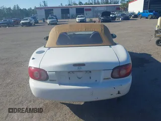 2003 Mazda MX-5 Miata Cloth z VIN JM1NB353730312566, wystawiony jako IAAI lot #41782864 z przebiegiem Nie podano mil oraz . Historia ofert i sprzedaży dostępna na DreamBid. Obrazek 16.