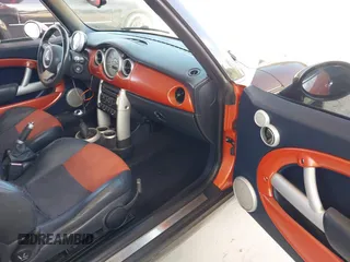 2005 MINI Convertible with VIN WMWRF334X5TF61026, listed as a IAAI auction lot 42125720 with 117,908 mi miles and . Bid and sale history available at DreamBid. Image 5.