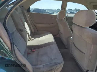 1999 Mazda 626 ES with VIN 1YVGF22C1X5896686, listed as a Copart auction lot 72012584 with 123,672 mi miles and Salvage Title. Bid and sale history available at carsss.com. Image 11.